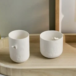 Räder fyrfadsstage i porcelæn med sommerfugl på siden